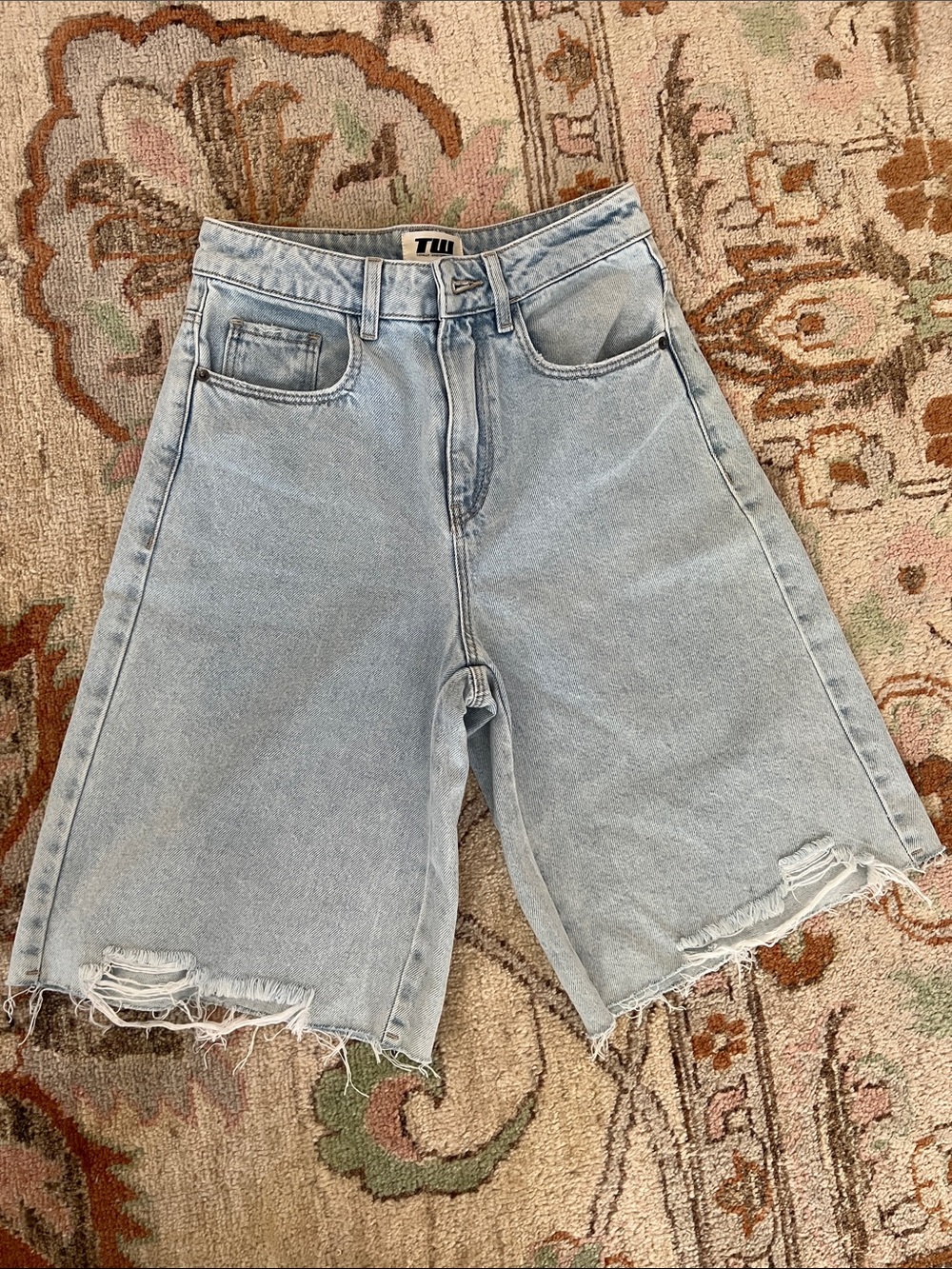 Light blue denim skater shorts